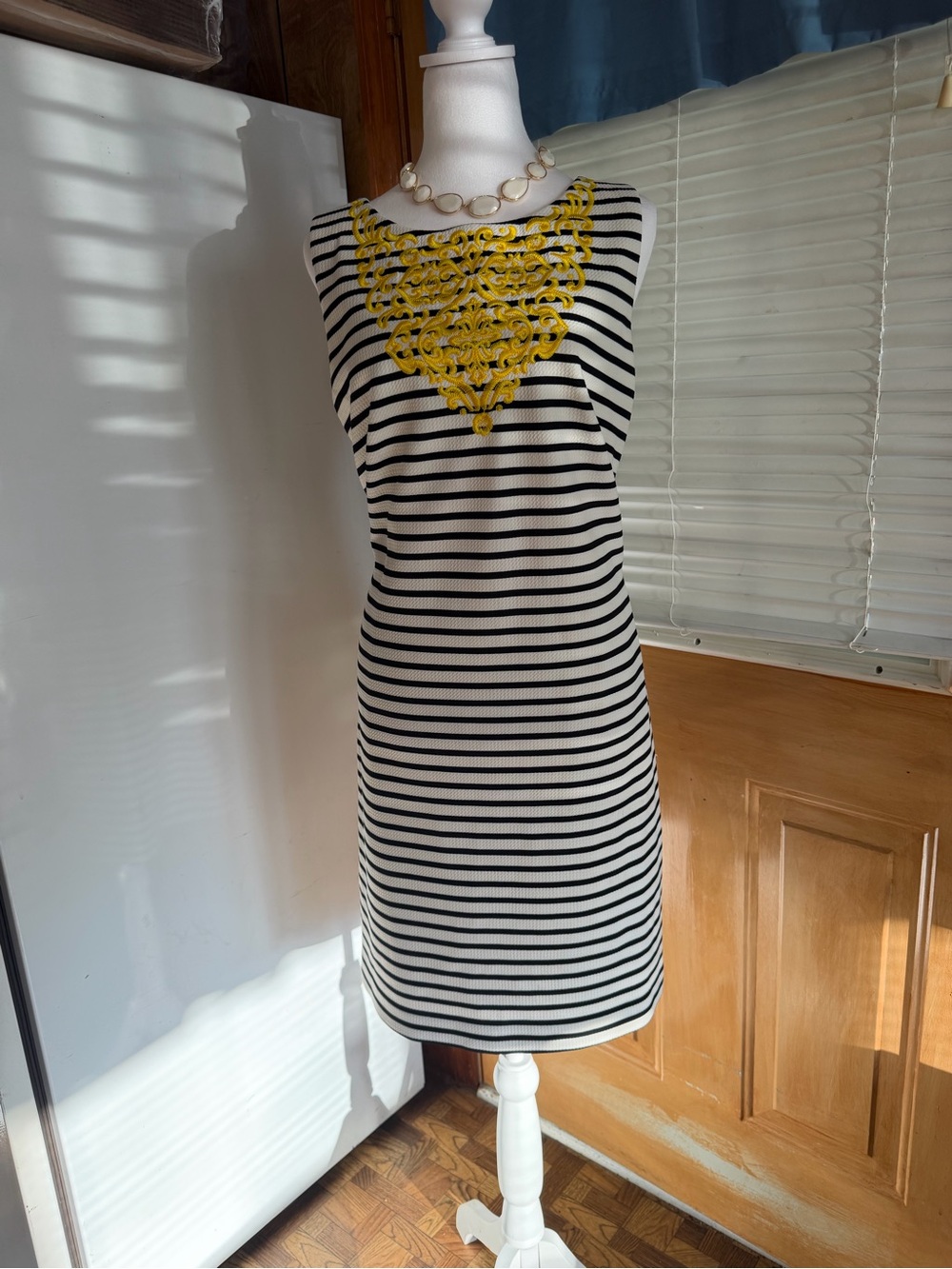 Sleeveless Black & White Striped Mini Dress with Yellow Embellishment
